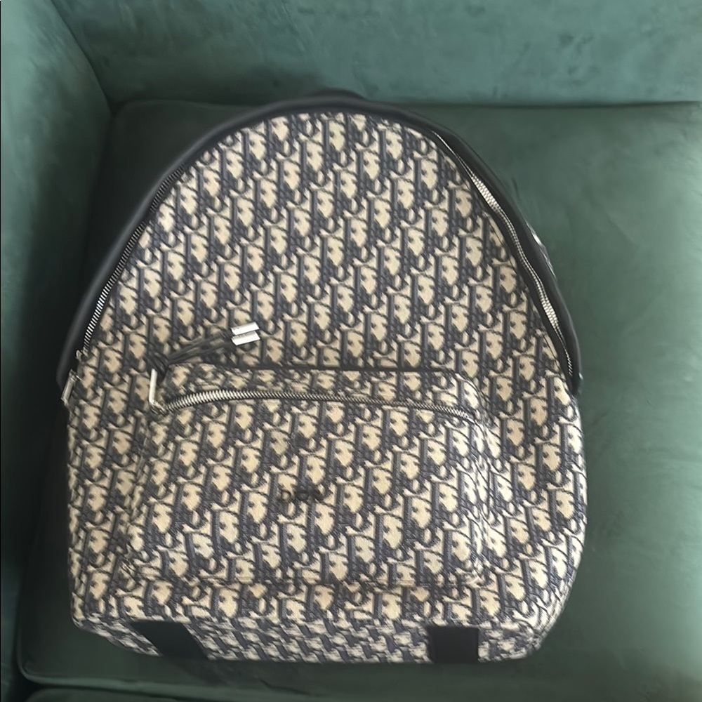 Dior Monogram Black and Cream Backpack can be used for school (not a mini )